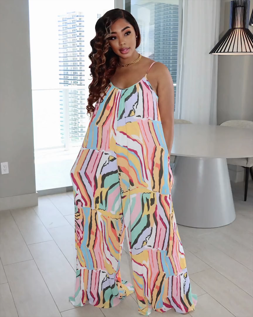 THE GET OUT IN IT JUMPSUIT
